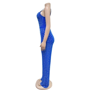 Macro shot of the luxury navy blue mesh jumpsuit with shimmering silver rhinestones