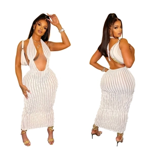 Detailed views of a white backless maxi dress with vertical textured wavy patterns