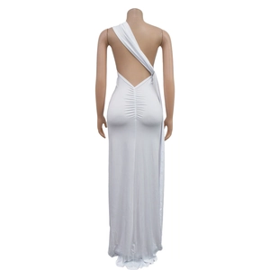 Detail of white backless dress featuring elegant pleats and soft satin texture on the back