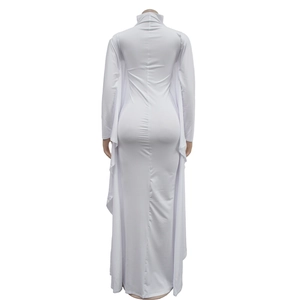 Detail view of white long sleeve dress showing elegant draped back design and high collar