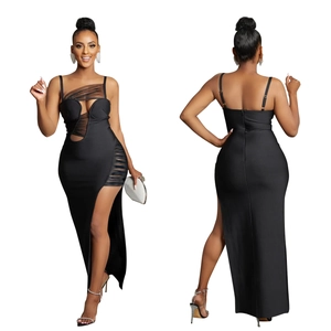 Front and back view of a black mesh hollow bandage maxi dress with high side slit
