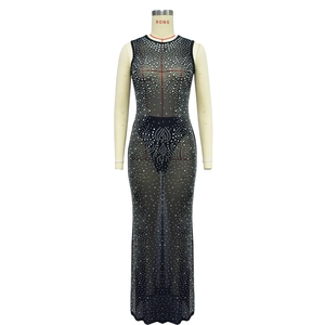 Detail of black mesh maxi dress featuring sleeveless design and shimmering silver rhinestones