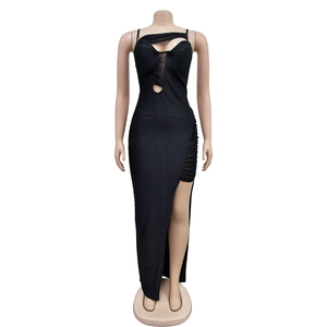 Detail of elegant black sleeveless long dress with mesh paneling and thigh-high side slit