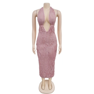 Close-up of pink bodycon maxi dress featuring wavy hollow texture and plunging V-neck