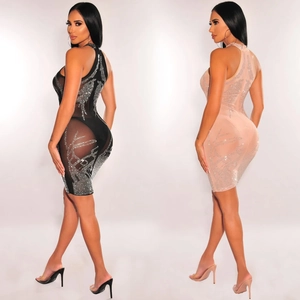 Detail of mesh mini dress with rhinestones and halter neck in black and nude colors