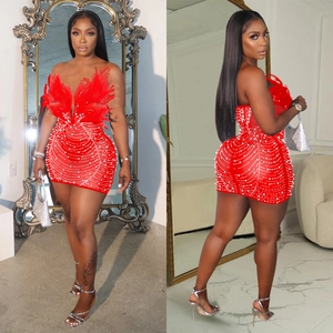 Elegant red bodycon dress featuring feather trim and wavy pearl embellishments