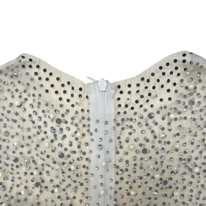 Détail macro du combishort en tulle avec strass, perles et fermeture éclair KCC