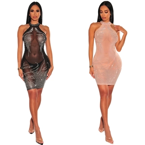 Detail showing sheer mesh fabric with hot-fix rhinestones on mini halter dress