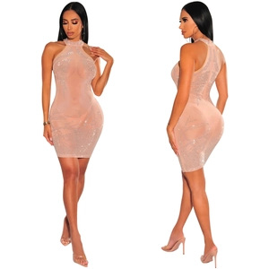 Detailed view of mesh bodycon dress with rhinestone patterns and halter neckline