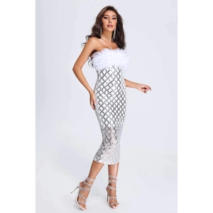 Detail shot of white sequin tube dress featuring elegant feather trim and diamond pattern