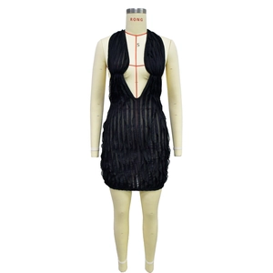 Detail of black deep V-neck halter mini dress featuring semi-sheer wavy striped texture