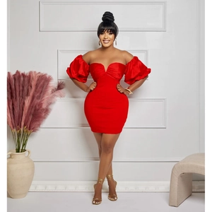 Detail view of red puff short sleeves and sweetheart neckline on a slim fit party dress