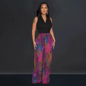 Close-up of V-neck sleeveless top and high-waisted wide-leg pants with abstract patterns