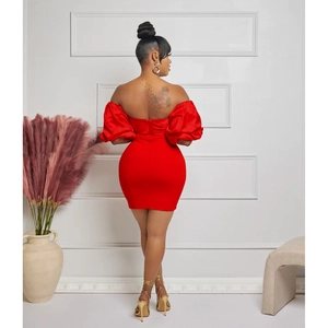 Detail of red off-shoulder mini dress featuring puffy sleeves and backless design