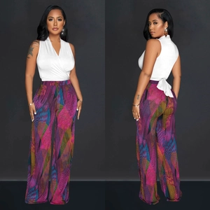 Women's 2-piece set with white V-neck sleeveless top and colorful abstract print wide-leg pants