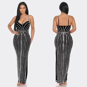 Front and back view of black slim fit maxi dress with silver vertical sequin stripes