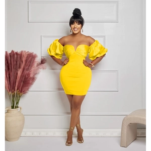 Detail of yellow off-shoulder mini dress featuring puff sleeves and pleated bust design