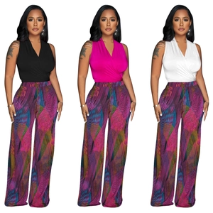 Close-up of three women's chic outfits with V-neck wrap tops and printed wide-leg pants