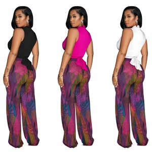 Women's chic V-neck sleeveless top and high-waist wide-leg pants set in colorful prints