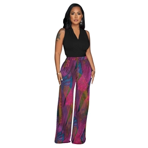 Detail of V-neck wrap top paired with colorful abstract print wide-leg trousers set