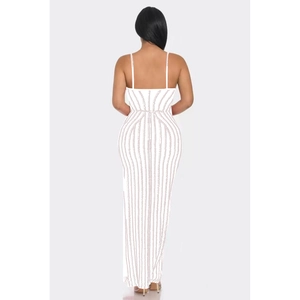 Detail of white sequin maxi dress with elegant open back and thin shoulder straps