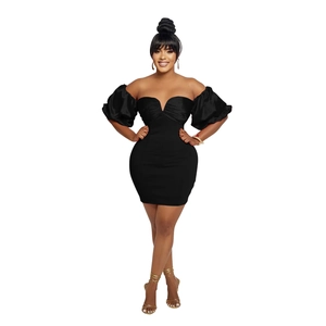 Detailed view of black off-shoulder bodycon dress with puff sleeves and sweetheart neckline