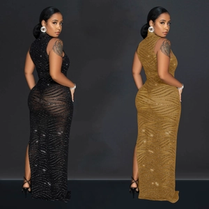 Detail of high-neck mesh maxi dress with wave pattern rhinestones and sheer fabric