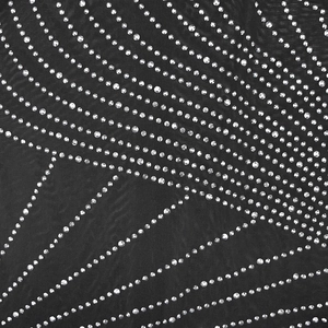 Detailed close-up of black mesh fabric with sparkling silver rhinestones in geometric patterns