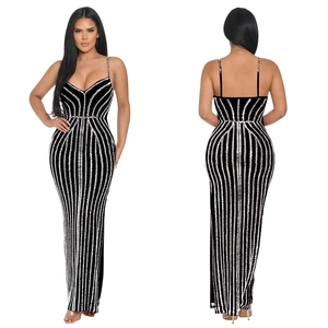 Detailed back and front view of a slim black dress with shiny silver sequin stripes