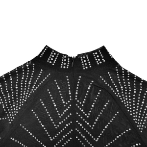 Close-up of black mesh top with silver rhinestones and back neck zipper detail