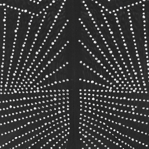 Detail of black mesh fabric with sparkling silver rhinestones in a sunburst pattern