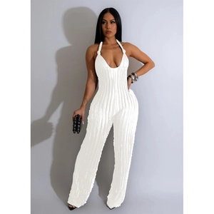 Detail showing white ribbed fabric texture and deep V-neck halter jumpsuit design
