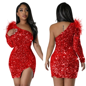 Front and back detail of red sequin one-shoulder dress with feather trim and side slit