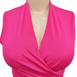 Close-up of fuchsia sleeveless deep V-neck wrap top with elastic knit texture