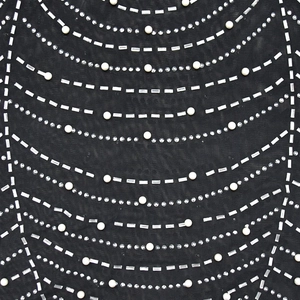 Close-up of black mesh fabric with white faux pearls, rhinestones and sequins details