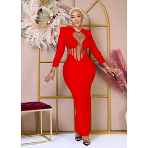 Detail of red bodycon dress with heart-shaped cutout and sheer mesh waist panel