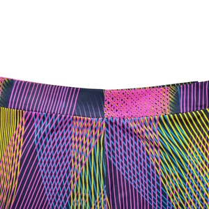 Close-up of vibrant geometric print waist and seamless stitching on yoga pants