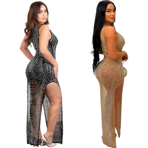 Elegant sleeveless mesh maxi dress with rhinestones and high side split in black and gold