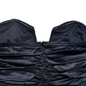 Detail of black satin ruched dress with invisible zipper and anti-slip silicone strip
