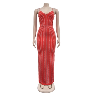 Detail of red floor-length evening gown with vertical silver rhinestone stripes