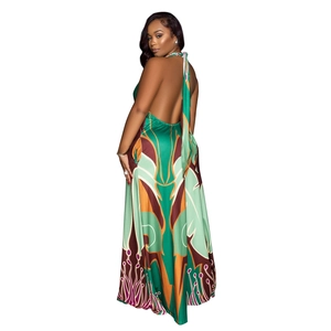 Detailed view of backless halter maxi dress with ethnic floral prints and silky texture
