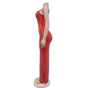 Detail shot of a red slim fit evening dress featuring silver rhinestone vertical stripes