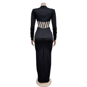 Rear view of black long-sleeve dress with waist mesh cutouts and hidden back zipper