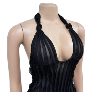Detail of black pleated halter neck bodysuit with deep V-neck and mesh fabric