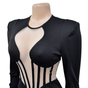 Detail of sheer black mesh bodysuit with heart-shaped bodice and corset-style bone structure