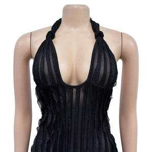 Detail of black mesh halter bodysuit featuring deep V-neckline and ruffled pleated texture