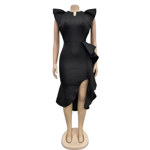 Detail of elegant black sleeveless dress with ruffled hem and V-neckline slit design