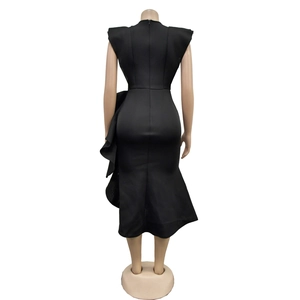 Detail of black sleeveless fishtail dress with cascading ruffles and back zipper closure