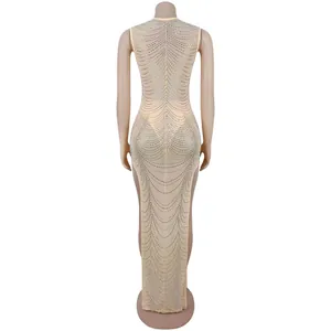 Detailed view of sheer mesh maxi dress with sparkling silver rhinestone wave patterns