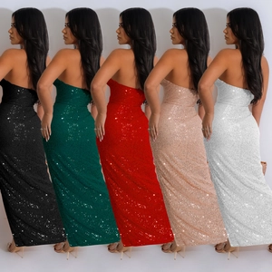 Detail showing backless sequin evening gowns in black, green, red, gold and white